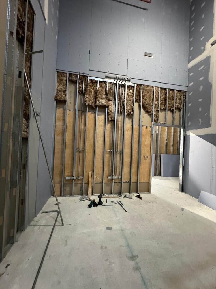 Stud partition and insulation, first fix