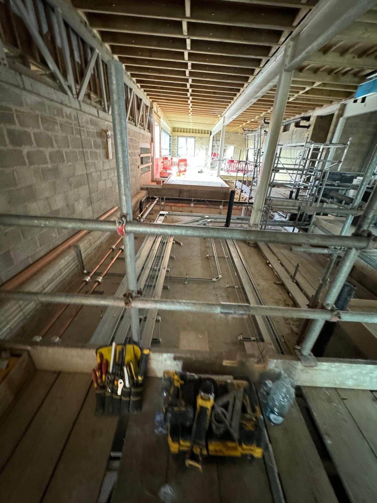 Scaffold-level view of first fix services, commercial build