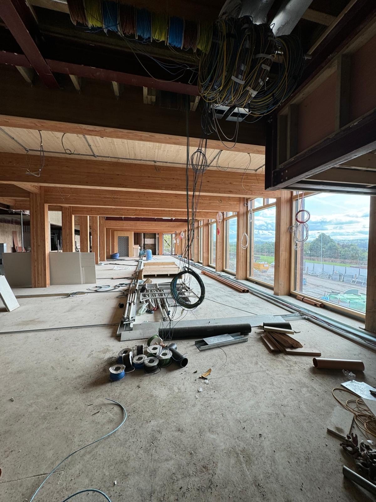 Open-plan CLT timber office fit-out, first fix cabling